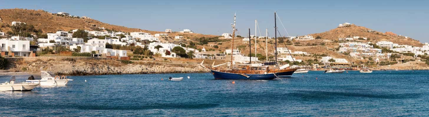 Boats off shore in Agios Ioannis in Mykonos