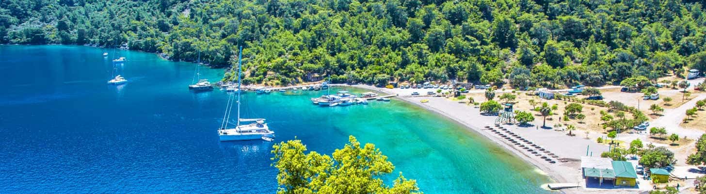 Turquoise waters & white sands of a beach in Dalaman