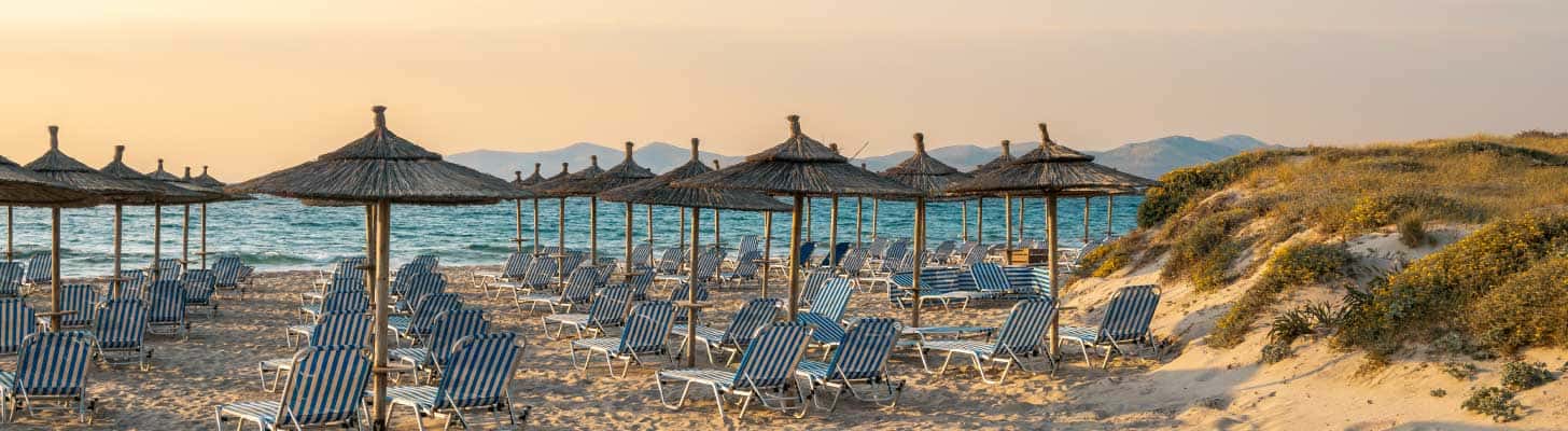 Sun loungers & umbrellas on Marmari beach in Kos