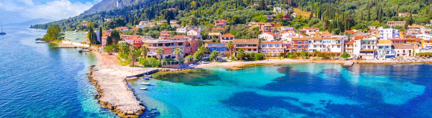 Shoreline of Benitses village in Corfu