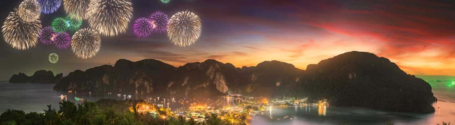 Fireworks over a tropical beach in Thailand