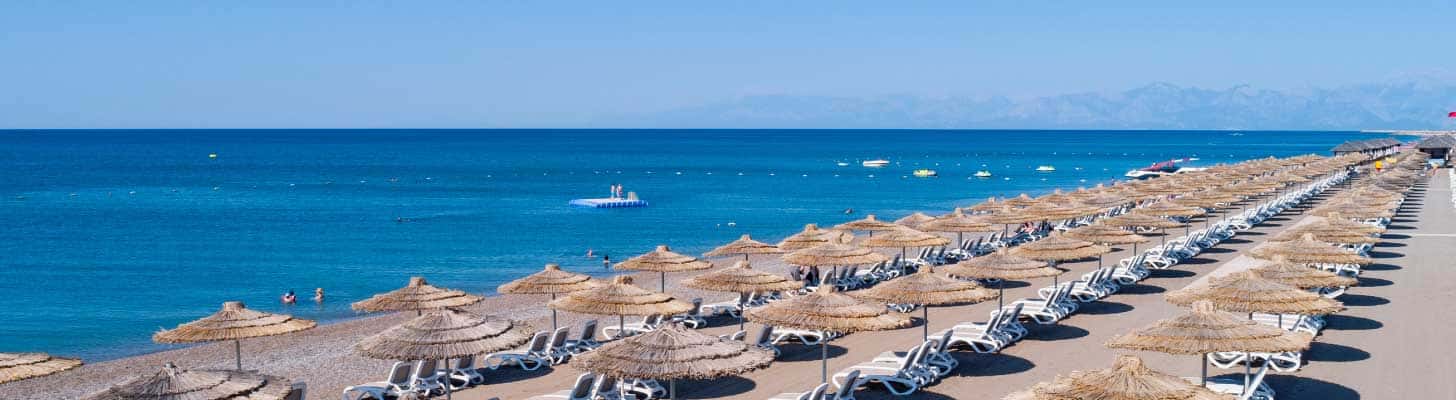 Sun loungers & umbrellas on the beach at Belek, Antalya