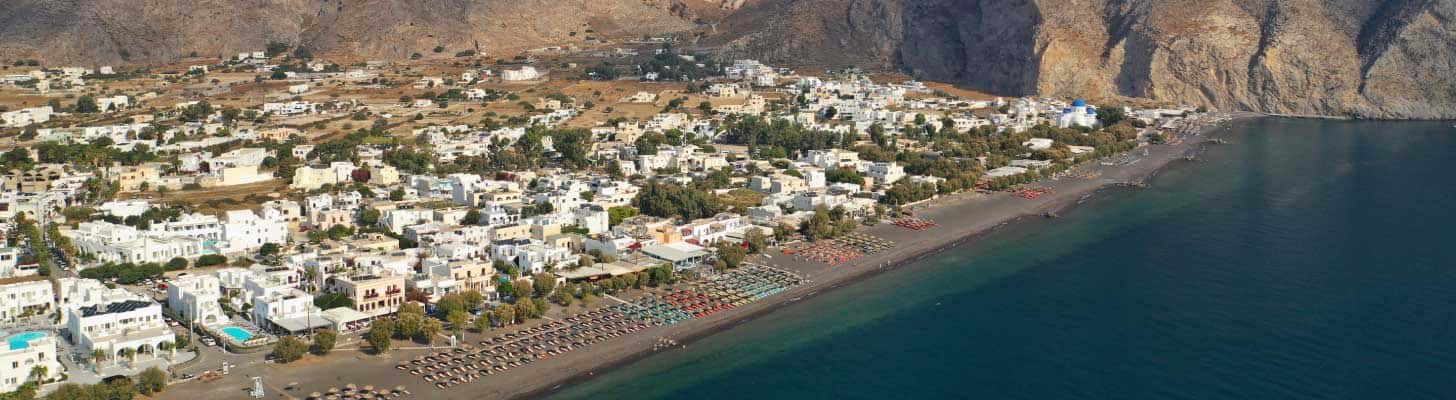 Aerial view of the black sands of Perissa in Santorini