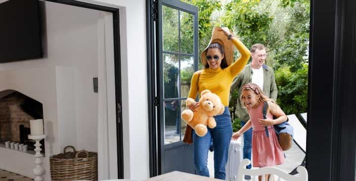 Family returning home from holiday