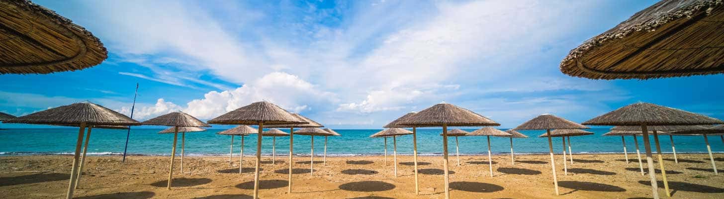 Sun umbrellas on the beach at Tsilivi in Zante