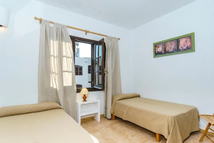 APARTMENT CAPACITY 5 THREE BEDROOM Room, Apartamentos Posidonia, Menorca